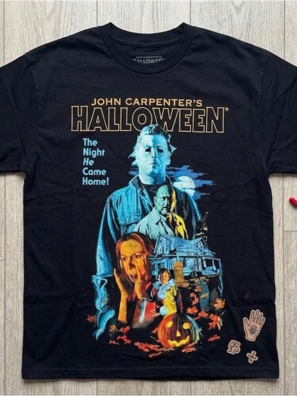 Black Halloween Graphic Tee with Multicolor Horror Print
